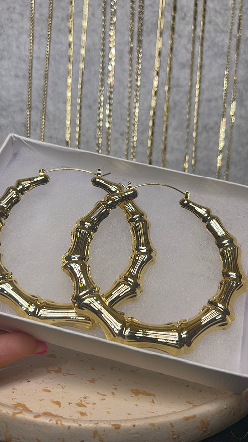 Bamboo earrings 
Gold plated palm sized