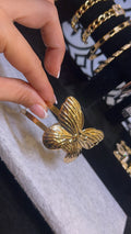 Butterfly arm cuff